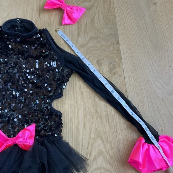 Dance costume competitive, parade sporting events. Black & pink sequin romper
